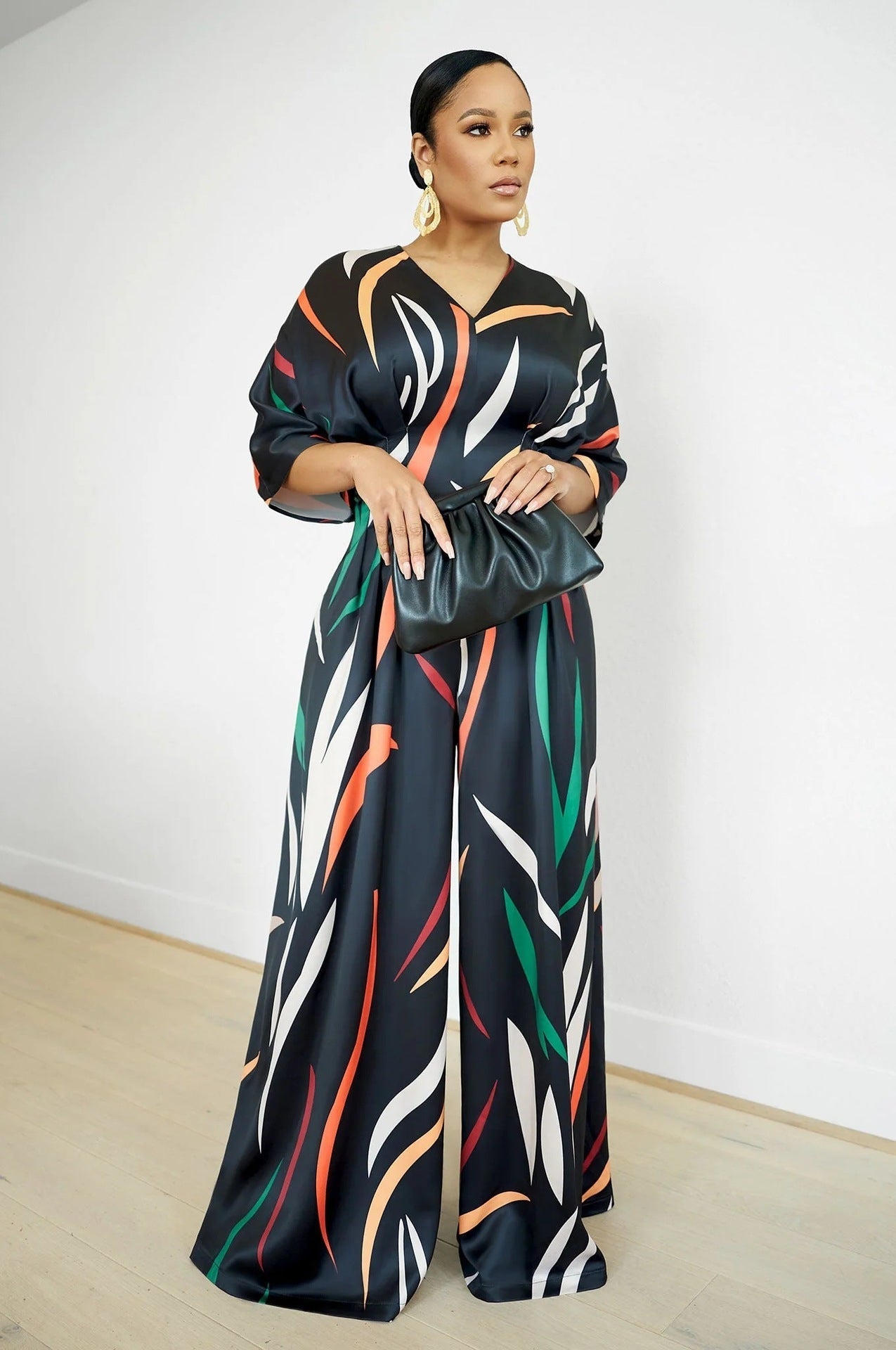 Sidra | Casual print jumpsuit met vleermuishals en mouwen