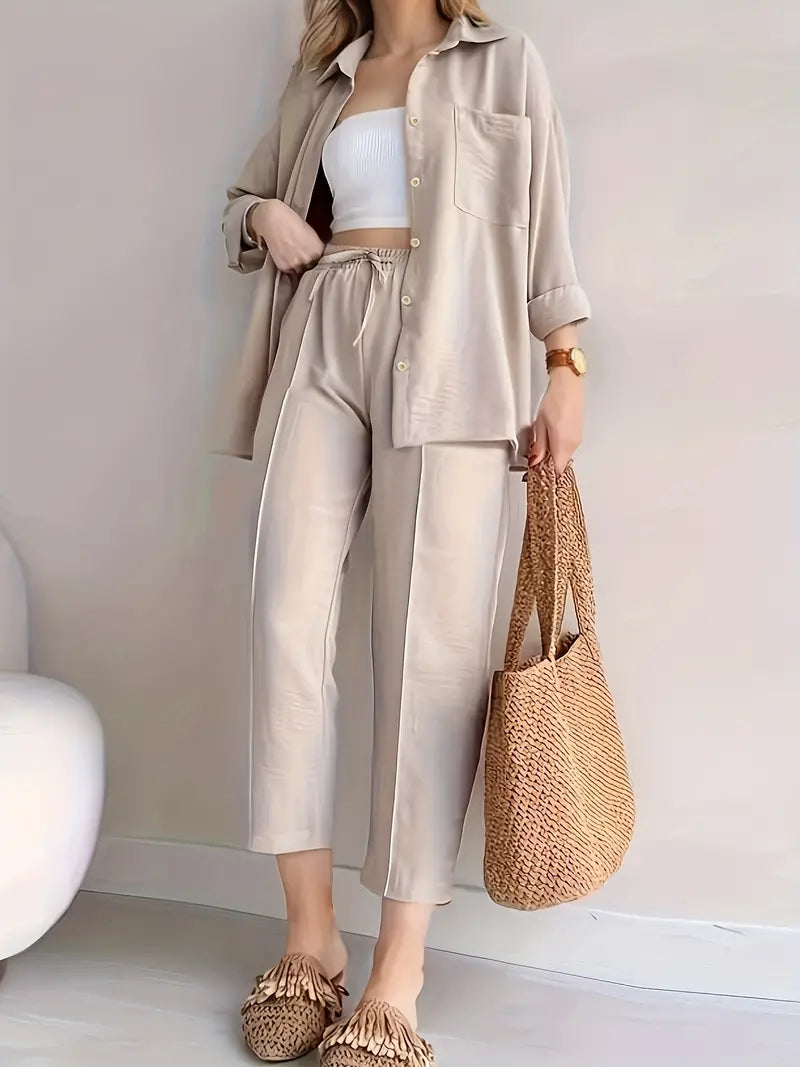 Set bestaande uit shirt met knoopsluiting en broek met trekkoord