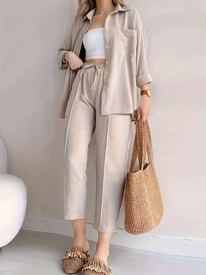 Set bestaande uit shirt met knoopsluiting en broek met trekkoord