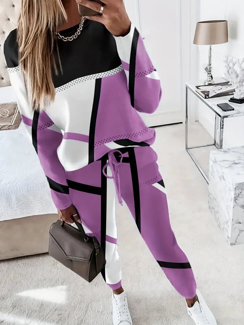 Che - Comfortabele set bestaande uit een shirt met lange mouwen en een ronde hals en een broek met trekkoord