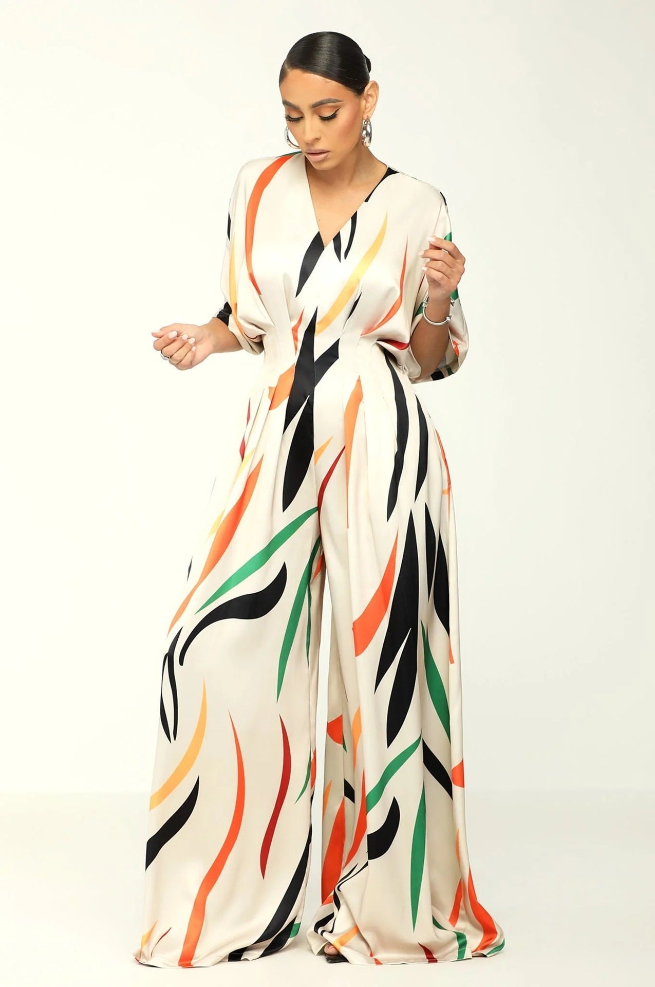 Sidra | Casual print jumpsuit met vleermuishals en mouwen