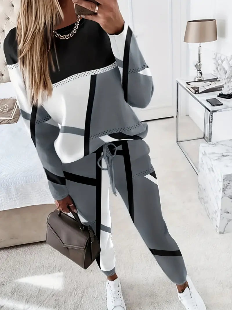 Che - Comfortabele set bestaande uit een shirt met lange mouwen en een ronde hals en een broek met trekkoord