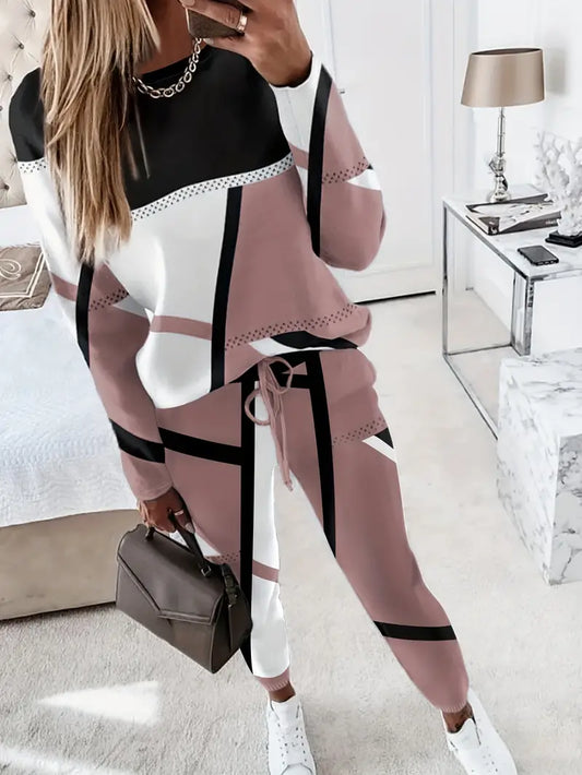 Che - Comfortabele set bestaande uit een shirt met lange mouwen en een ronde hals en een broek met trekkoord